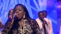 Sinach , there's an overflow (live) (video and lyrics)